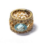 A blue topaz and diamond ring, unmarked, finger size Q. Gross weight 13.5 grams.