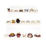 A collection of porcelain miniatures to include a King Street Derby dolls house teapot and cover,