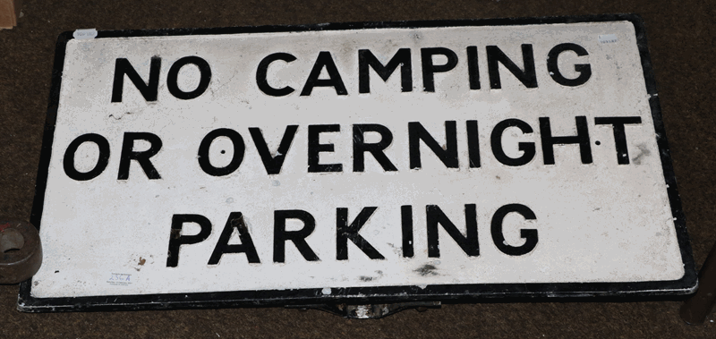 A painted cast metal sign, ''No Camping Or Overnight Parking'' 44cm by 66cm