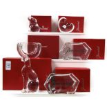 A quantity of boxed Baccarat crystal, to include a statue of a cat, a rabbit, a stylized