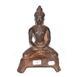 A 19th century cast metal statue of a seated Buddha, possibly Thai, 31cm