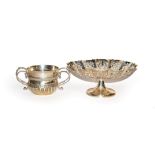 A Victorian silver porringer by Wakely & Wheeler assayed London 1887, together with a George V