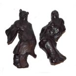 A pair of 19th century Chinese root wood carvings formed as immortals, 24cm (2)