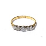 A diamond five stone ring, the old cut diamonds in white rubbed over settings, to a yellow tapered