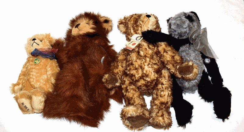 a Hermann Wilhelm bear and a smaller musical Hermann bear, two Charlie Bears with labels,