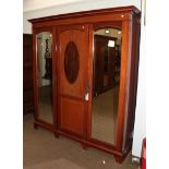 An Edwardian mahogany triple mirror front wardrobe with satinwood banding, 187cm by 50cm by 208cm