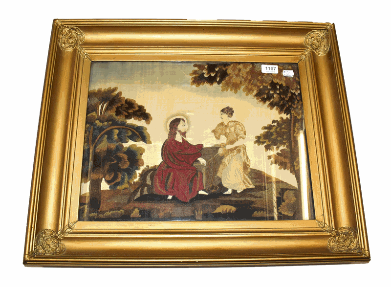 Framed early 19th century embroidery on silk depicting Rebecca at the Well, seated with Jesus in red