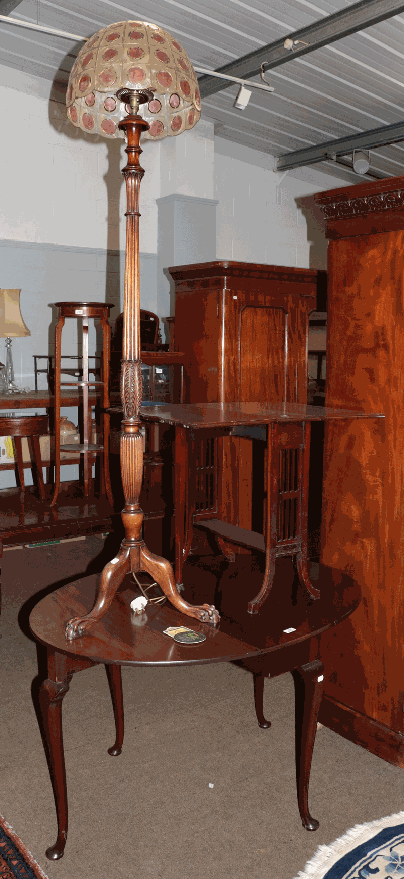 A Victorian mahogany Sutherland table banded in satinwood, 61cm by 76cm (extended) by 62cm