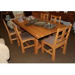 A Treske Furniture solid oak refectory dining table, the trestle base with twin stretchers, 220cm by