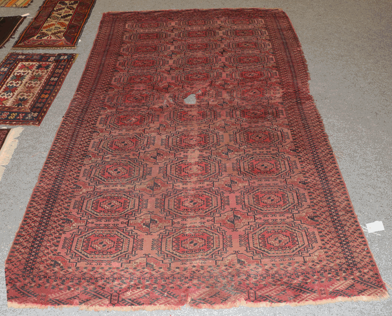 Tekke rug, the field of salor guls enclosed by multiple borders 250cm by 146cm together with ten