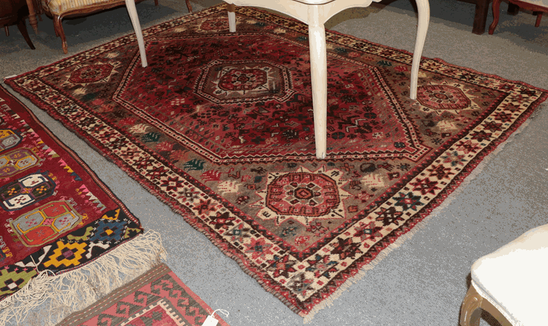 Shiraz Carpet, the raspberry field with stepped medallion framed by spandrels and stellar motif