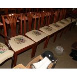 A set of seven George III mahogany dining chairs including one carver armchair (7)