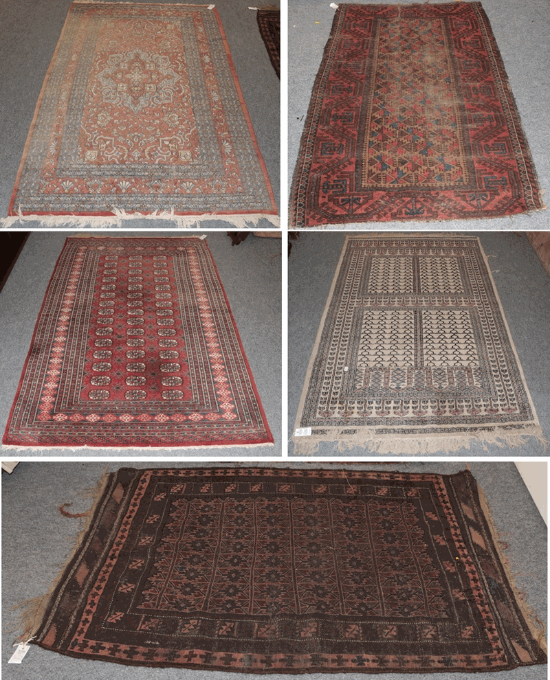 Lahore Bukhara Rug, the field with rows of guls enclosed by multiple borders, 186cm by 125cm,