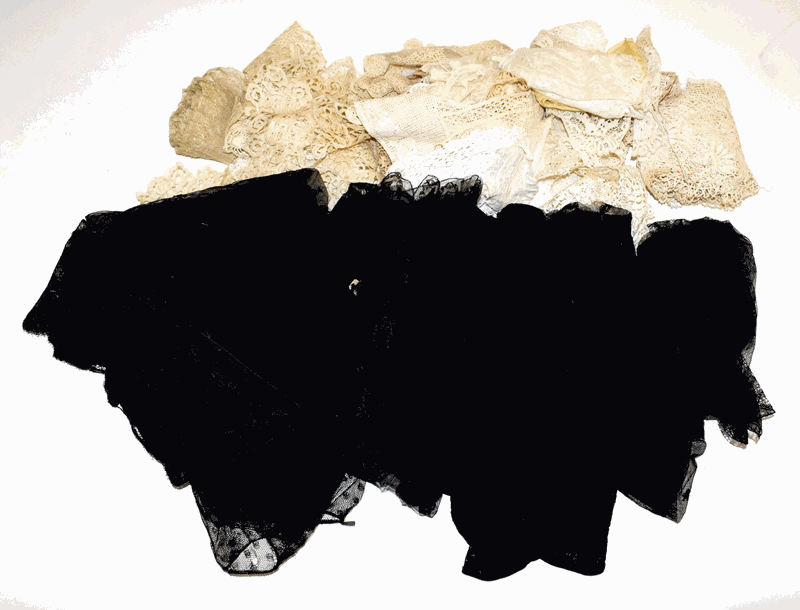 Assorted late 19/early 20th century black and cream lace, comprising black stole flounces,