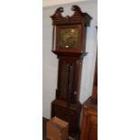 A carved oak thirty hour longcase clock, the square brass dial signed Ewbank, Elland . Case faded in