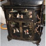 A Chinese lacquered serpentine cocktail cabinet with ivory and hard stone applied decoration
