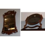 A walnut and parcel gilt fret cut mirror, 65cm by 37cm together with a mahogany framed dressing