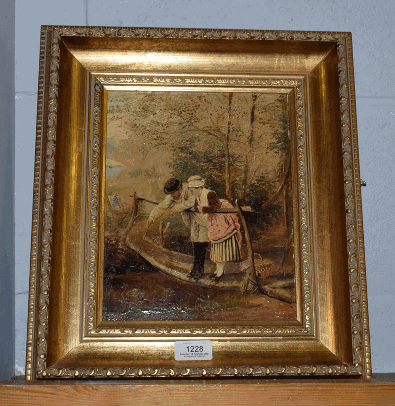 A 19th century gilt framed oil on panel of two figures standing on a bridge above a stream, 25cm