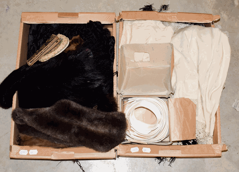 Assorted 19th century and later costume accessories, including a cream wool two tier cape, black