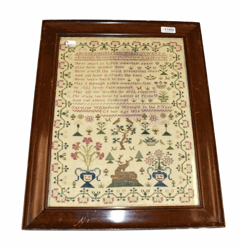 An alphabet sampler worked by Caroline Wilberforce Aged 9, Dated 1834, alphabet and verse worked