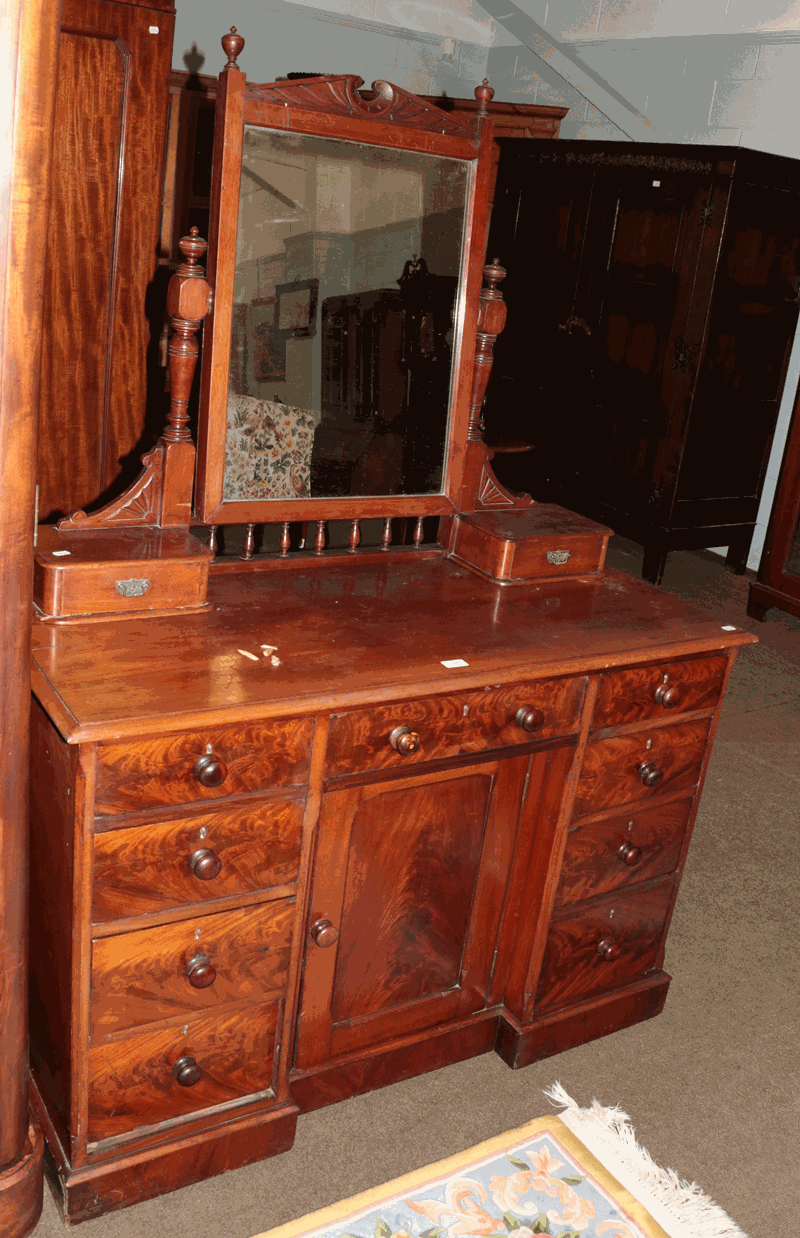 A Victorian mahogany dressing table with mirror, 122cm by 53cm by 169cm