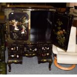 A Chinese lacquered side cabinet with ivory and hard stone applied decoration depicting figures