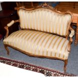 A French style carved walnut two seat settee