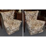 A pair of upholstered wingback armchairs (2)
