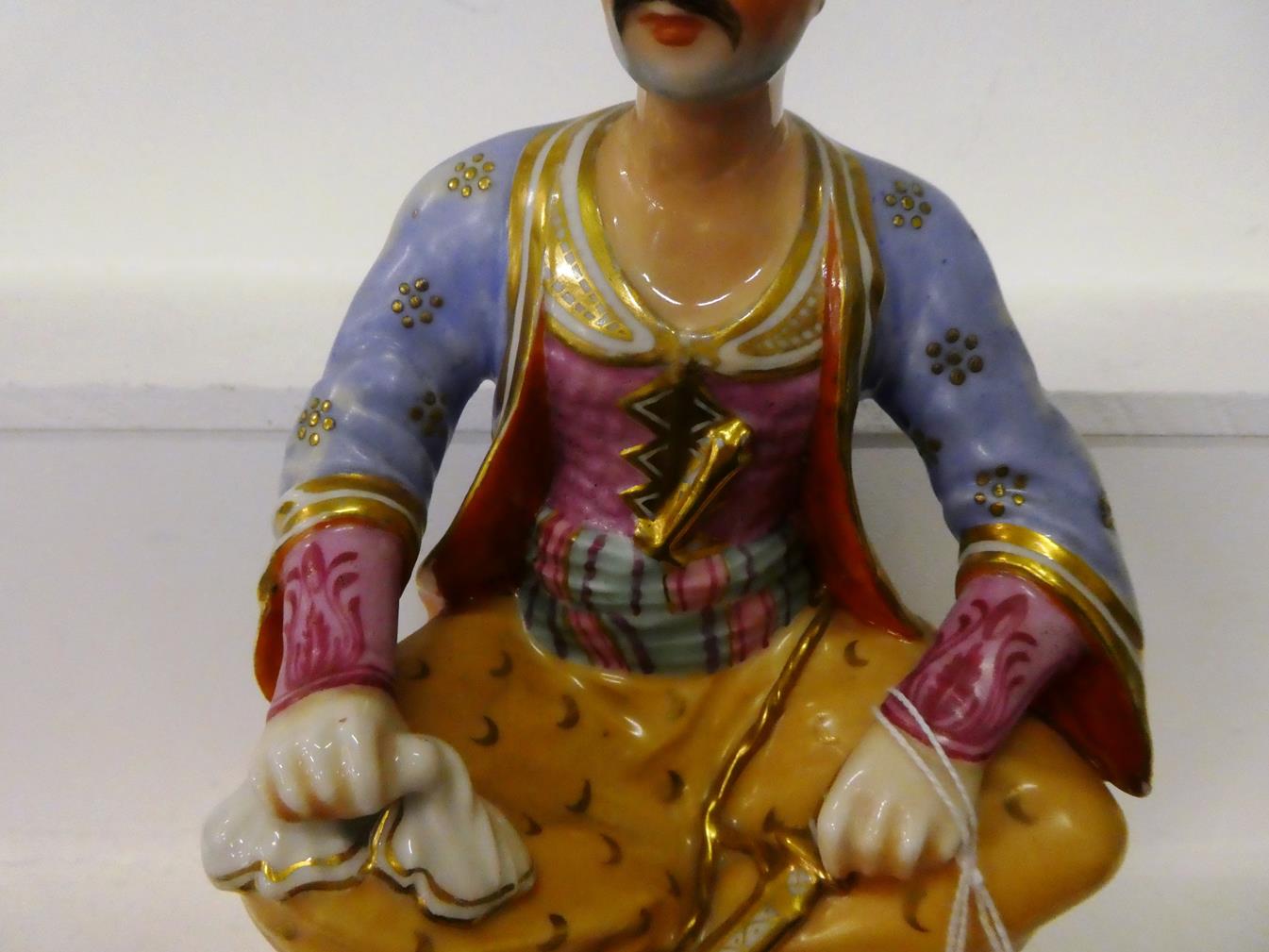 A pair of Paris porcelain figures formed as a seated Turk and his companion, raised in gilt Rococo - Image 15 of 27