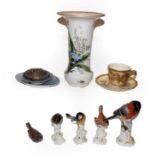 A 20th century Meissen model of a bird, Royal Copenhagen items, Royal Worcester tea cup and