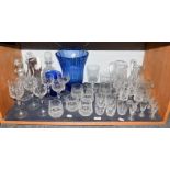 A quantity of cut lead crystal including a part suite of Waterford drinking glasses, decanters and