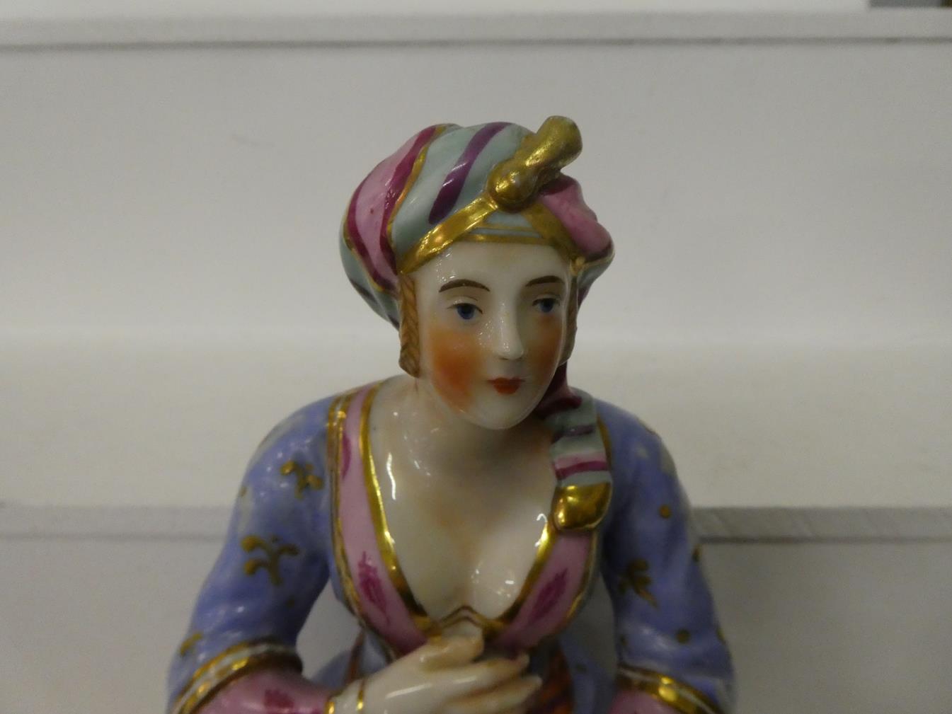 A pair of Paris porcelain figures formed as a seated Turk and his companion, raised in gilt Rococo - Image 2 of 27