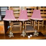 A set of three modern metal effect table lamps, each 54cm high, with red stripe fabric shades (3)