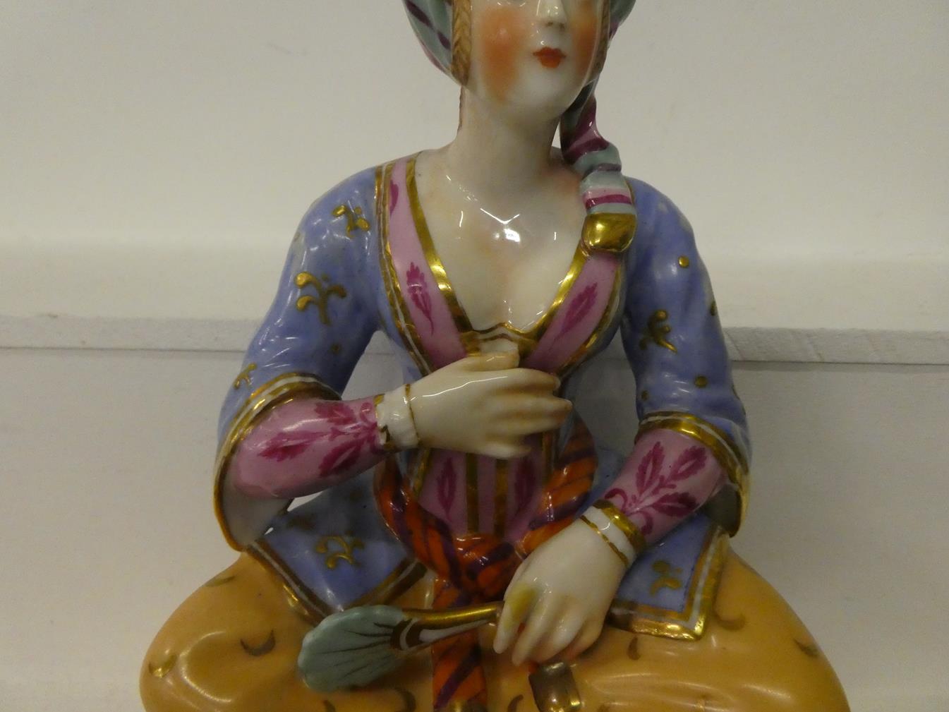 A pair of Paris porcelain figures formed as a seated Turk and his companion, raised in gilt Rococo - Image 3 of 27