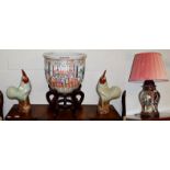 A pair of modern Chinese models of cockerels, a table lamp, a decorative fishbowl (3)