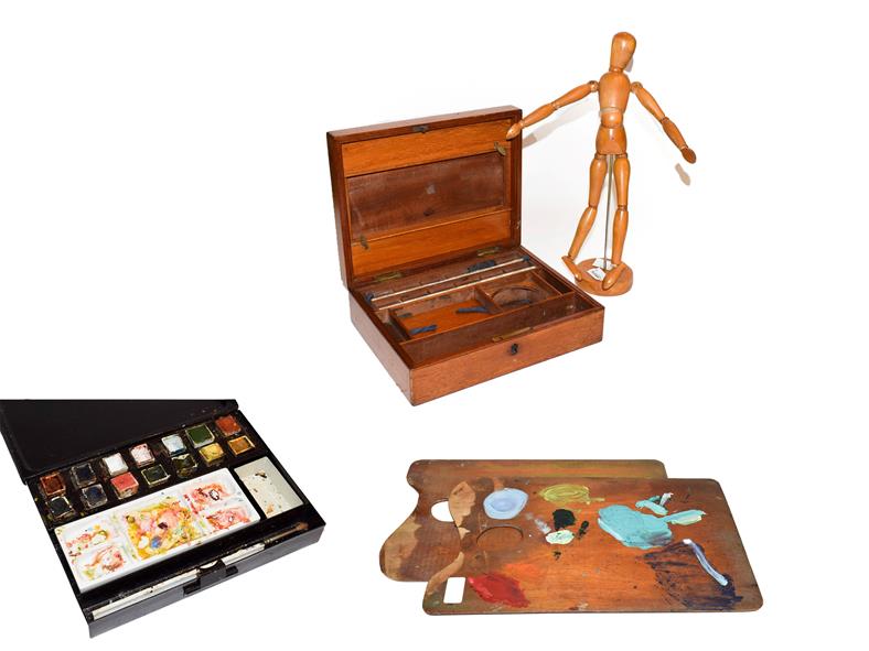 An artist's dummy with jointed limbs, a Winsor & Newton watercolour tin, mahogany Reeves & Sons