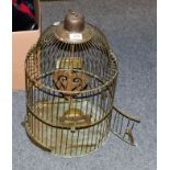 An early 20th century brass wirework bird cage, 31.5cm diameter by 51cm high