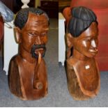 A pair of carved hardwood African tribal head figures, 77cm high (2) Provenance: By repute, vendor