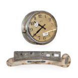 A chrome plated ships bulkhead timepiece, signed Smith, 26cm diameter, together with a clinometer,