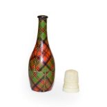 A tartan ware thimble case of skittle form, inscribed Drummond and housing a thimble, 7.5cm. Some