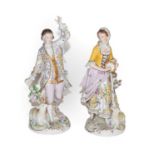 A pair of Sitzendorf figures, Shepherd and Shepherdess, blue printed marks, 26cm high. Good