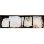 Four boxes of assorted white linen and cotton cloths, chenille cloths and other textiles (four