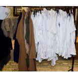 Part rail of naval whites including jackets, tunics, shorts etc and canvas clothing