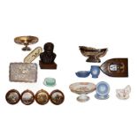 A group of items including a resin bust, decorative coat of arms, pot lids, ceramics and toys,
