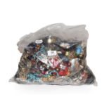 A large collection of costume jewellery, beads etc (one bag)