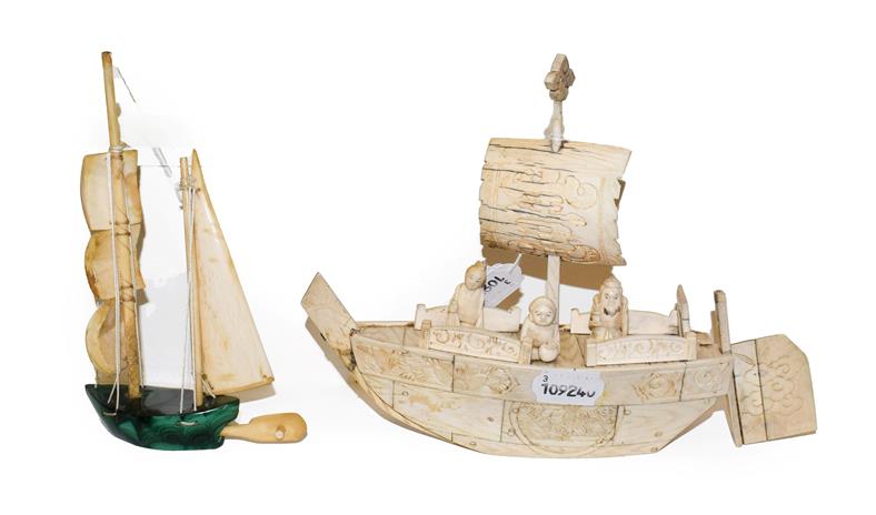 A Chinese bone carved model of a boat with three figures, 18cm high and a similar with malachite