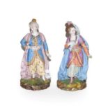 Pair of 19th century French porcelain figures of Turks, decorated in coloured enamels, 29cm high .