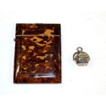 A Victorian tortoiseshell card case and a white metal rotating seal fob for days of the week (2) .