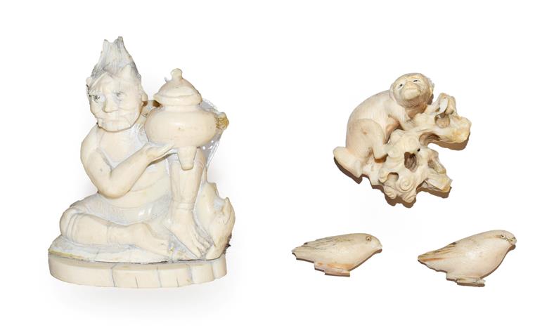 A Japanese Meiji Period carved ivory figure or a demon with urn (a.f.), 9cm high