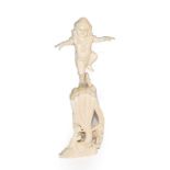 A 19th century Indian carved ivory figure of a Deity stood on a pedestal of five snakes, 30cm high